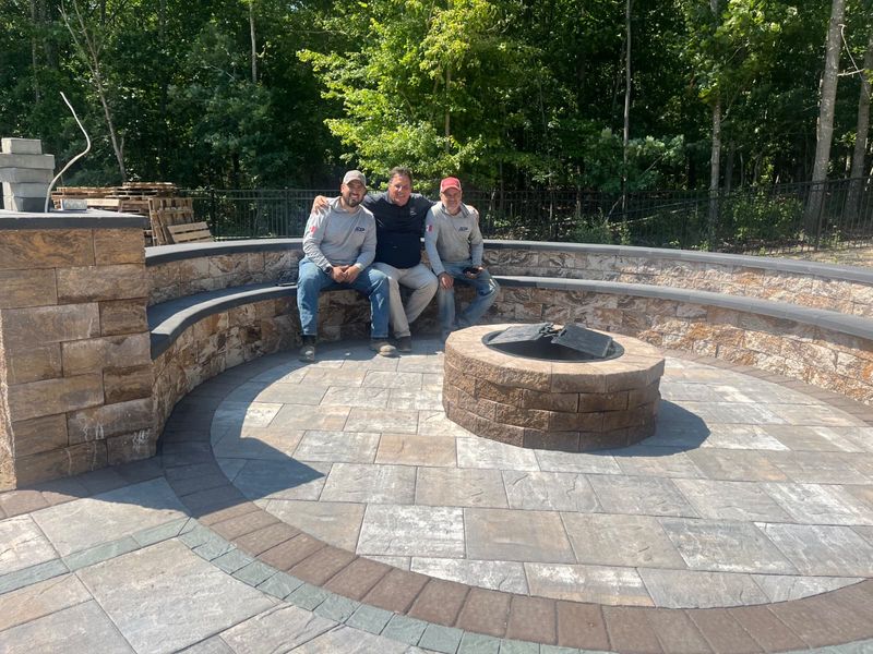 The JDG crew on a finished fire pit patio